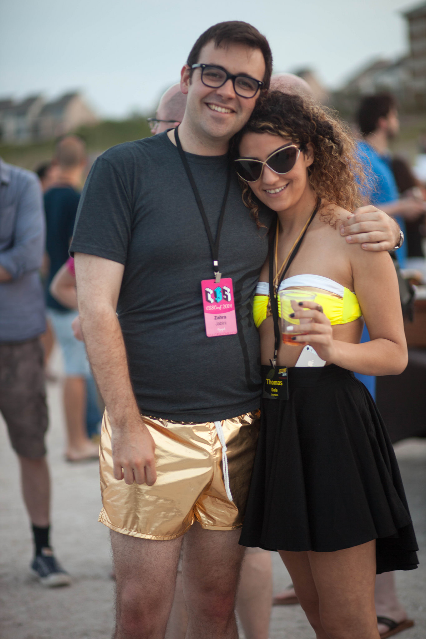 Tom Dale in his gold shorts with Zahra Jabini at JSConf 2014. Photo by Matthew Bergman